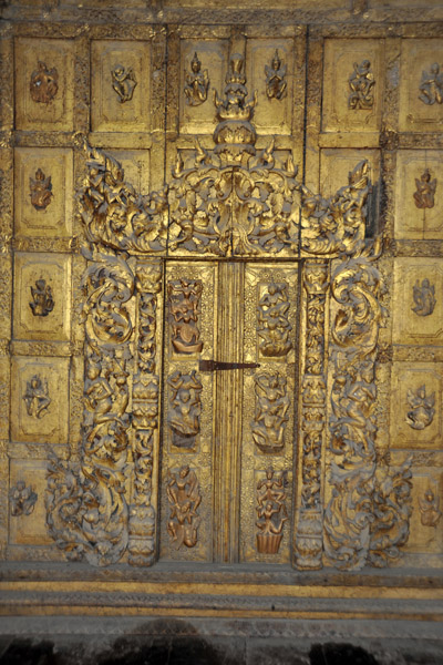 Wall and door covered with wood carvings