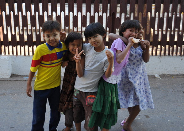 Burmese children outside the Golden Palace Monastery