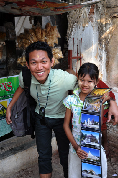 Dennis and a young postcard seller, Mandalay