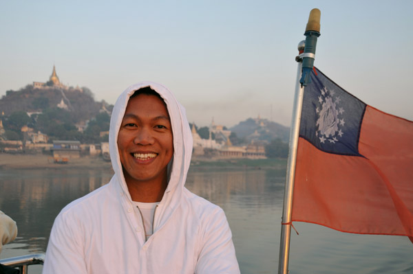 Dennis on the Malikha as we pass Sagaing