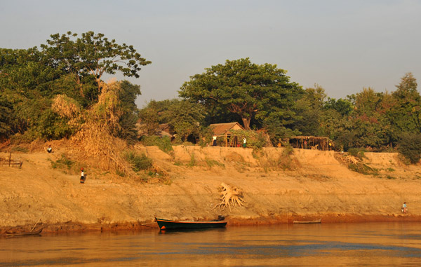 Banks of the river in the dry season as we pass a village