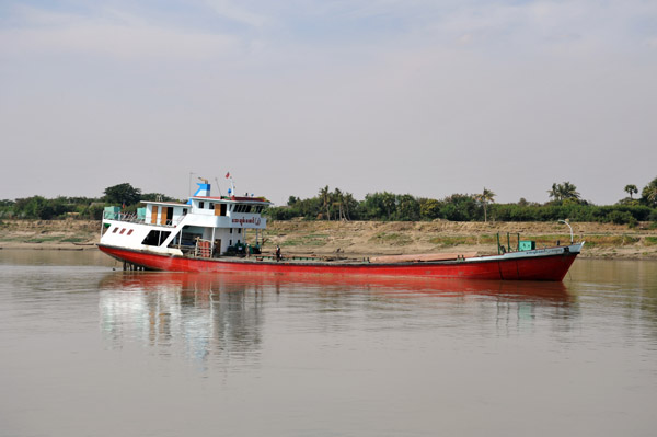 Substantial cargo vessel steaming up the Irrawaddy