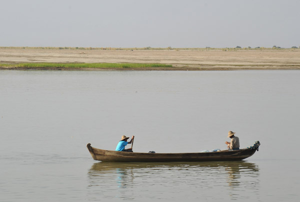 In the wet season, the river widens to reach the distant trees