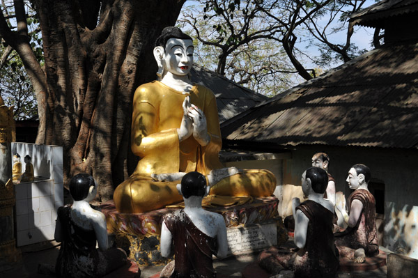 Buddha teaching along the stairs leading to Popa Taung Kalat Monastery