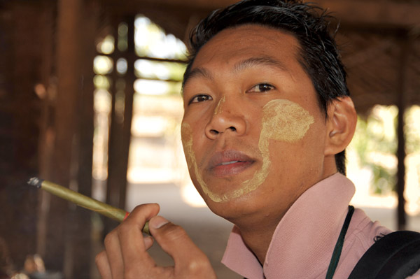 Dennis with his Thanaka facepaint and a Burmese cheroot