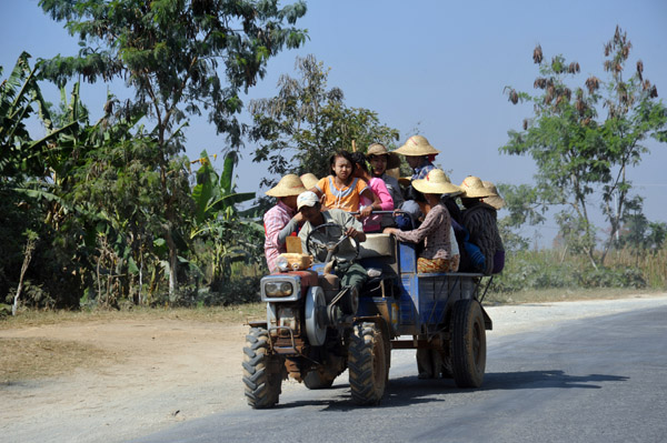 Tractor loaded with farmers