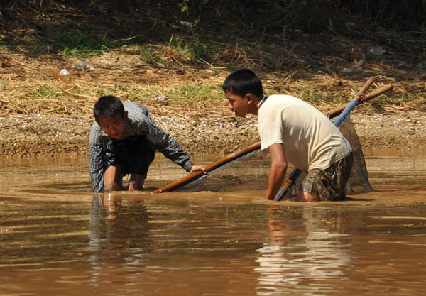 Boys fishing for something in the Nan Chaung Canal, Nyaung Shwe