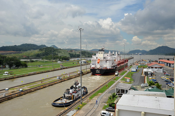 The tug boat Alianza tied up alongside at the Miraflores Locks