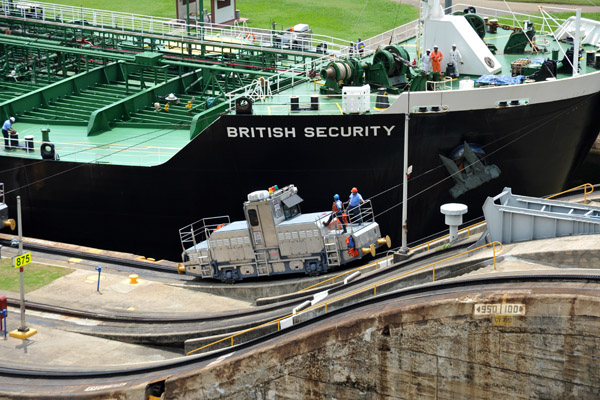 One of the tug locomotives assisting the British Security through the Panama Canal