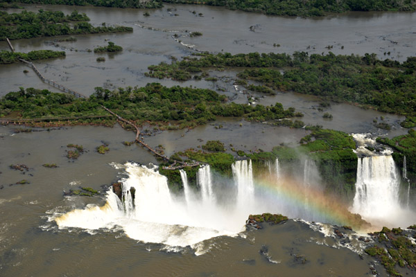 A rainbow in the mist tossed up from the Devil's Throat - Iguau Falls aerial