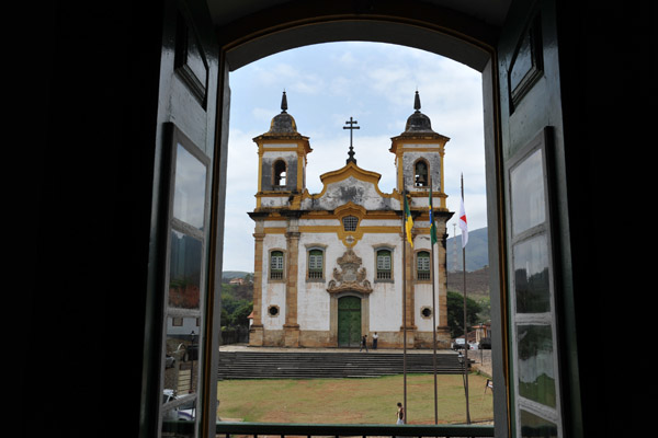 Church of St. Francis seen through the doors of Town Hall, Mariana