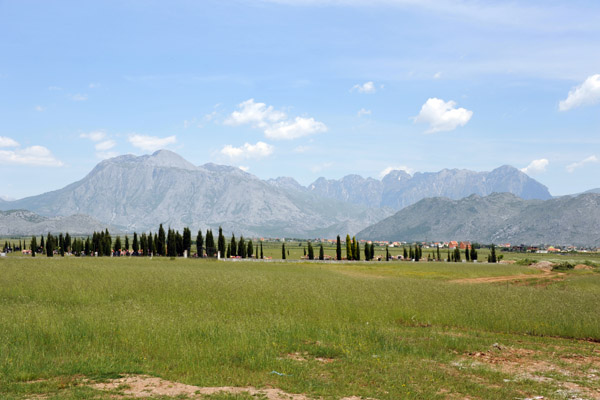North Albanian Alps with fertile plain on the west side of Lake Shkodr