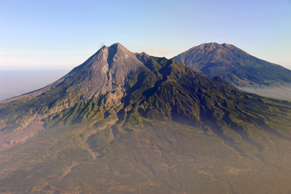 Mt. Merbabu comes into view behind Merapi