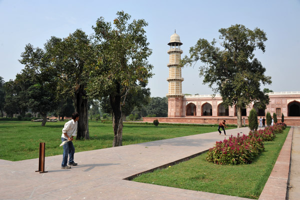 Playing cricket in the garden of Jahangir's Tomb