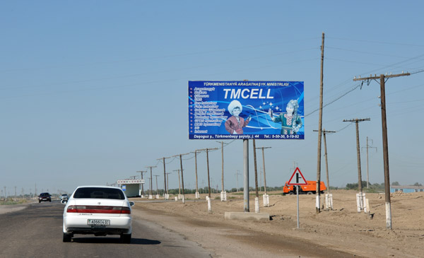 Billboard for TMCELL on the edge of Konye-Urgench