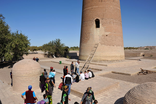 Local tourists gathered around the base of the Gutlug Timur Minaret, Old Urgench