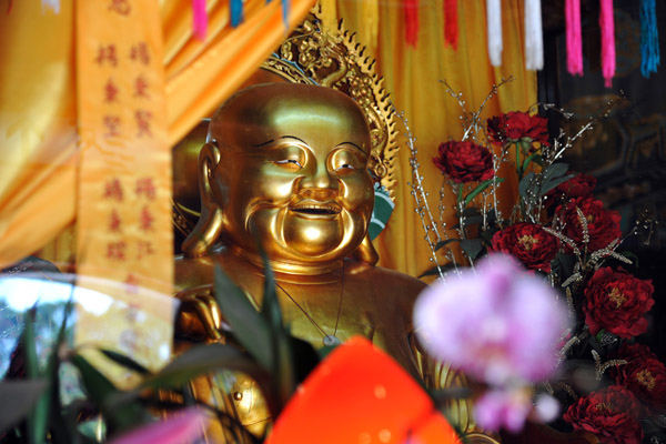 Laughing Buddha inside the main entrance, Po Lin Monastery, Hong Kong