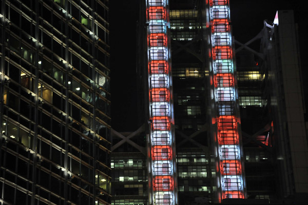Red and white lights of the HSBC Building at night, Hong Kong