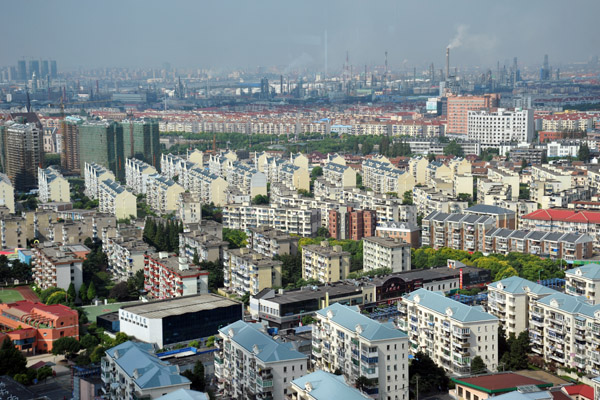 Gaonan New Village with a major industrial area in the distance, Pudong