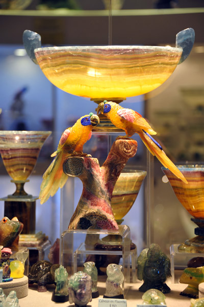 Lapidary parrots and translucent stone bowls