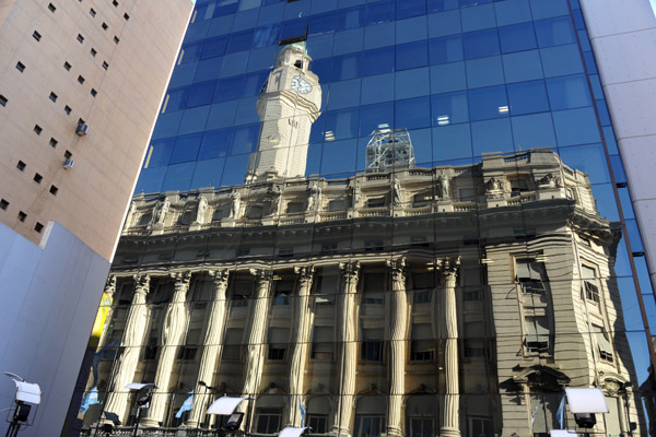 Reflection of the Buenos Aires City Legislature in the neighboring glass office building