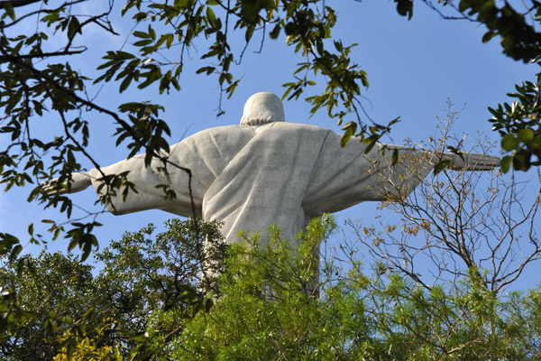 Christ the Redeemer from the back through the trees