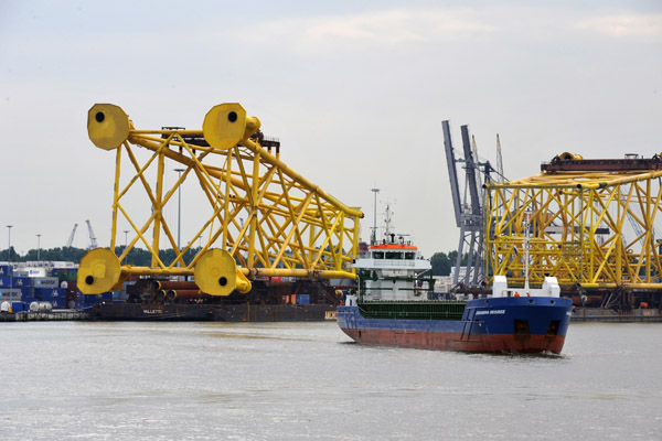 Johanna Desiree and barges with giant yellow towers, Port of Rotterdam