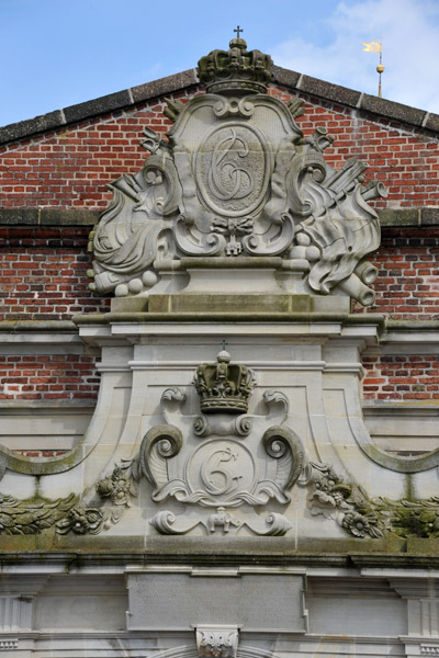 Royal monograms over the main gate