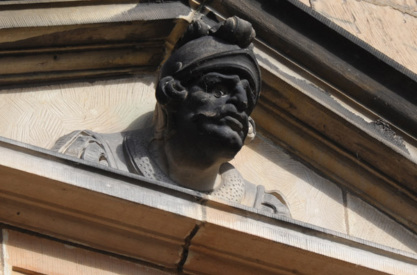 A carved head in the courtyard of the Kronborg