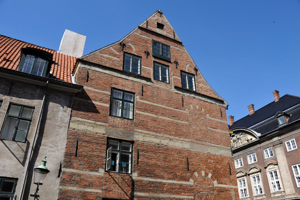 Old house with some windows bricked overSankt Annæ Gade