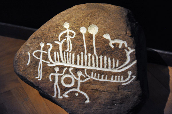 Rock carving of a ship with sun images, 1100-700 BC