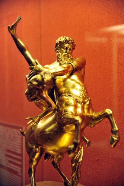 Golden figure of a centaur on top of a table clock, 1657