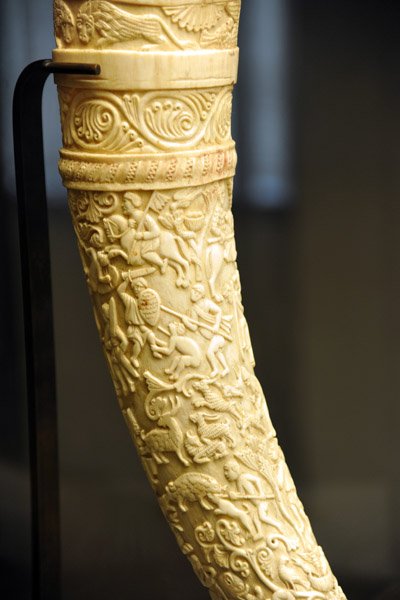 Ivory drinking horn with fighting, hunting and pastoral scenes, ca 1100