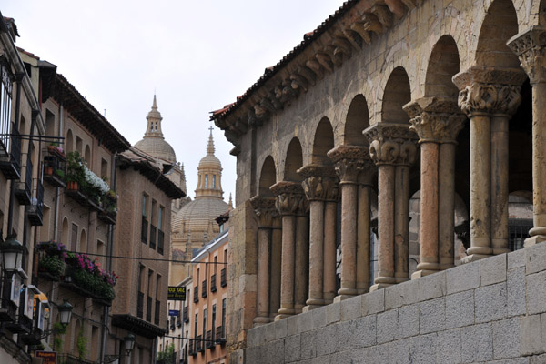 Romanesque portico of Iglesia de San Martn with the Cathedral domes in the distance