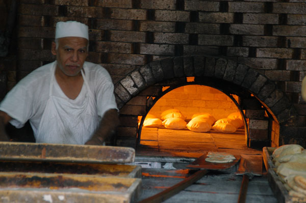 Baking Arabic bread, Tripoli medina