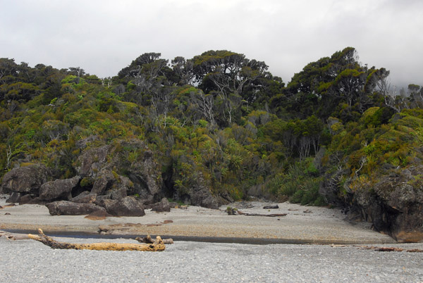 Waita River reaching the Tasman Sea