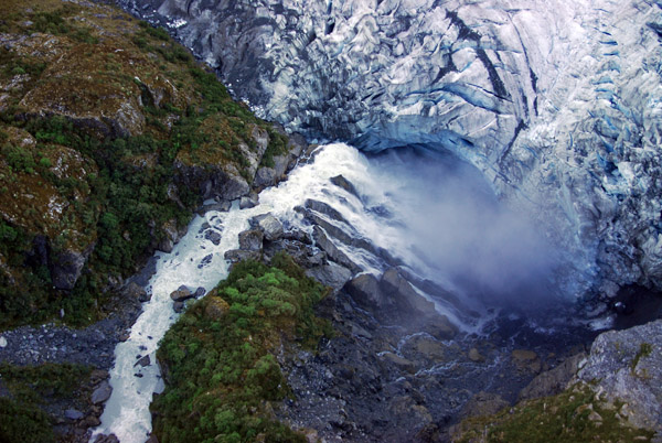 Waterfall onto Fox Glacier