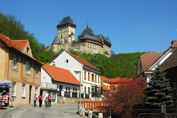 Main Street of Karltejn with the castle overlooking the village