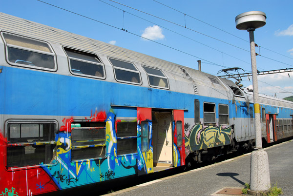 Graffiti-covered Czech double decker train, Beroun Station
