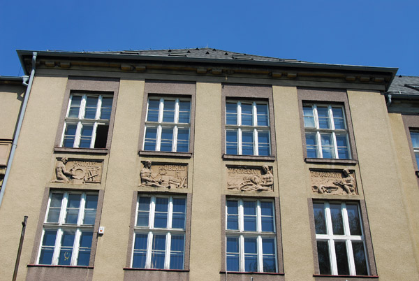 Business Academy and State Language School with reliefs of  Industry, Commerce, Agriculture, Transportation - Beroun