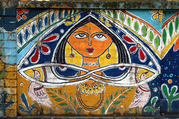 Wall mural of a woman with two birds, Dhaka