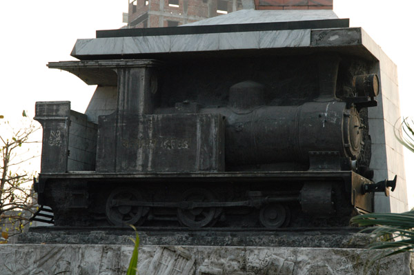 The monument encorporates a small steam locomotive