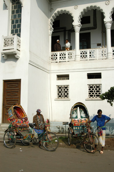 Rickshaws wait at the High Court of Bangladesh