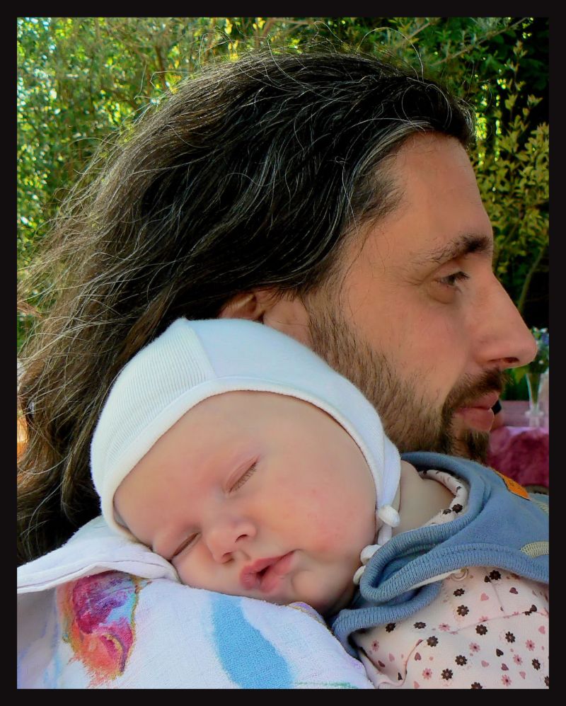 On fathers shoulder