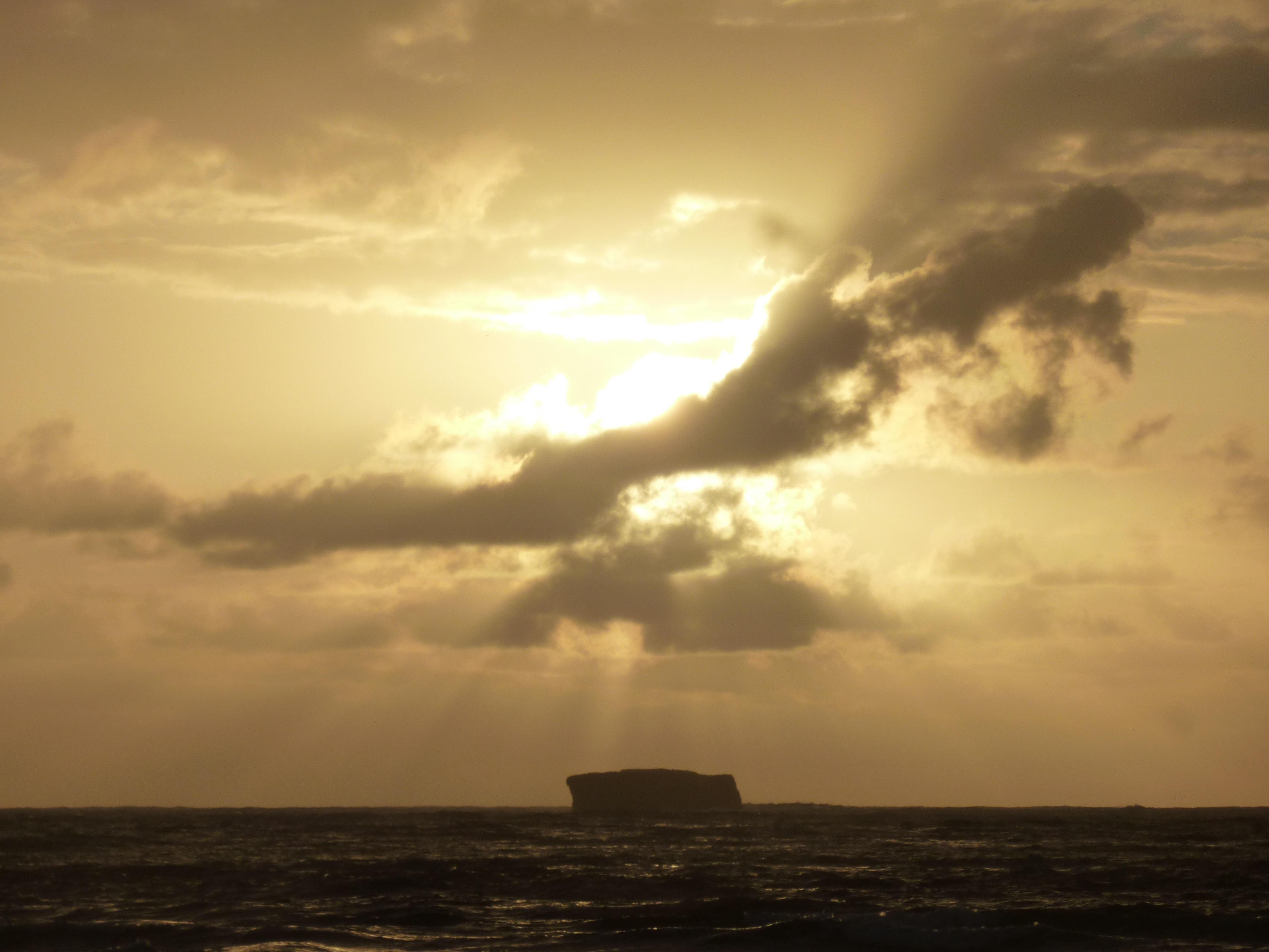 behind the clouds