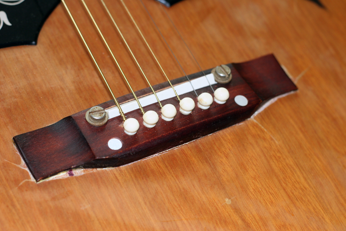 vintage Kay acoustic bridge.jpg