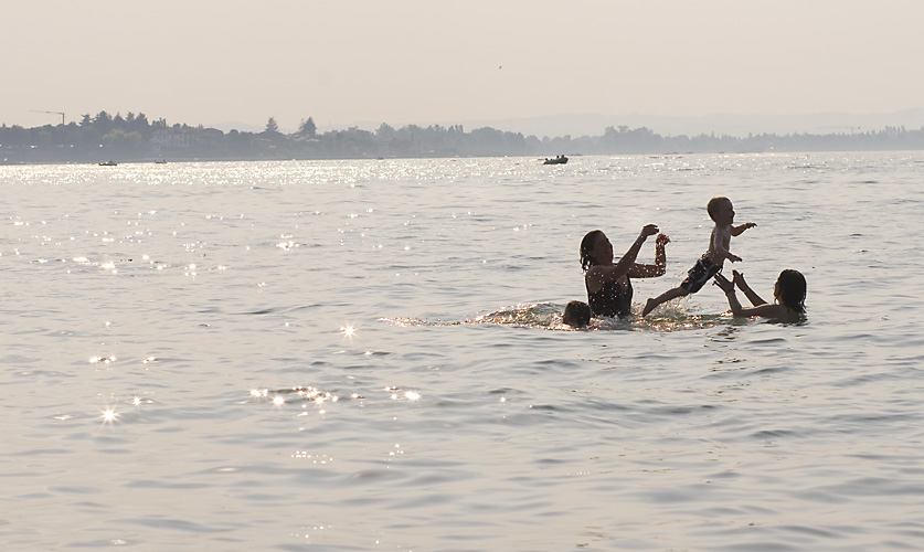 Jo and Kylie throwing Luis during our cool off swim in the lake on the way back to Milan