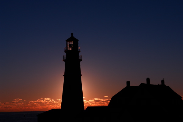 DSC09908wow.jpg DAWNS MAGIC GLOW at Portland Head Light by donald verger maine lighthouses