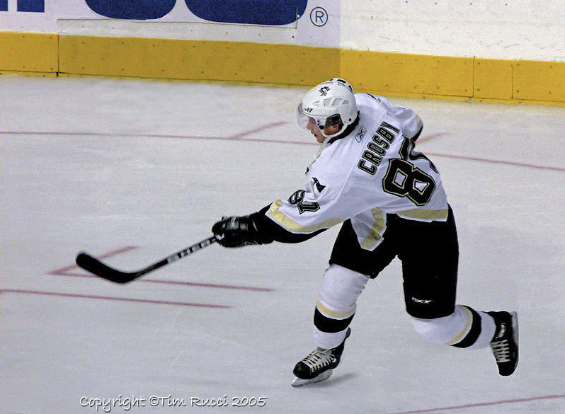  101754 - Pittsburgh Penguins Sidney Crosby shooting the puck