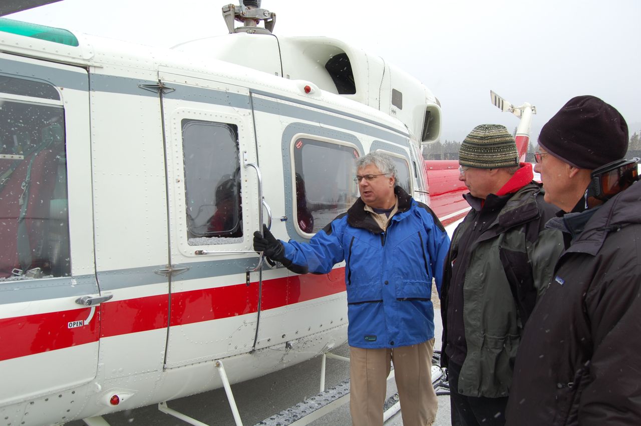 Pilot Don McTighe with helo door instructions